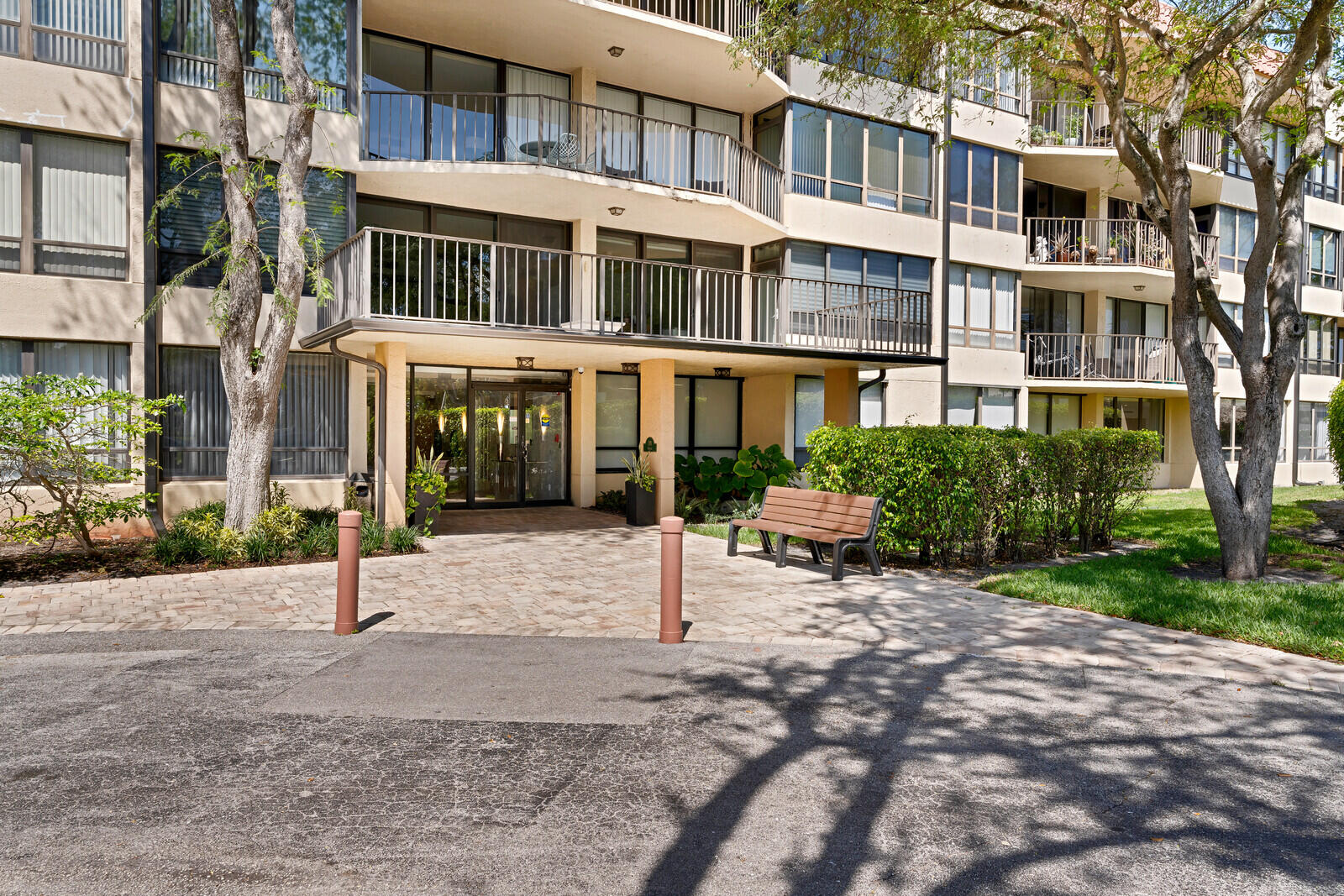799 Jeffery Street, Unit 4070 Boca Raton, FL 33487 - Photo 22 of 41 a view of a brick building next to a yard