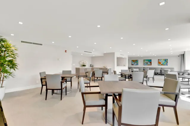 a view of a livingroom with furniture and window