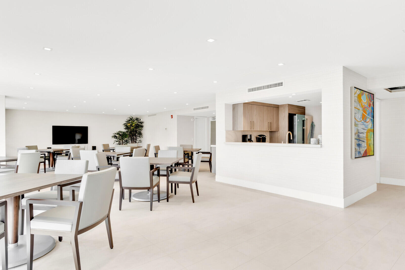 799 Jeffery Street, Unit 4070 Boca Raton, FL 33487 - Photo 27 of 41 a living room with furniture and a flat screen tv