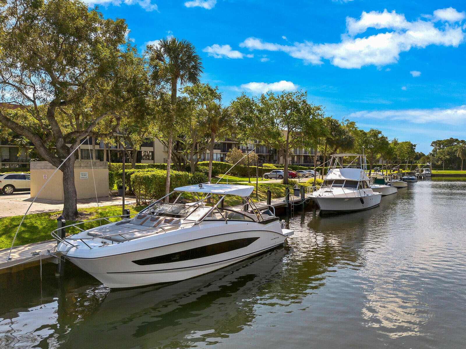 799 Jeffery Street, Unit 4070 Boca Raton, FL 33487 - Photo 31 of 41 a view of a lake with boats and trees