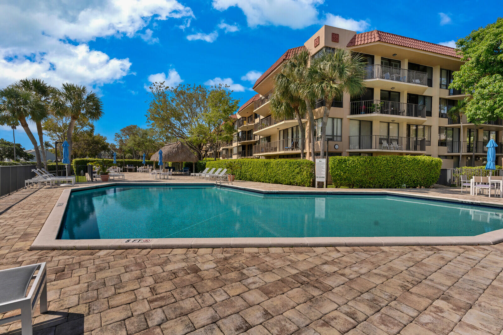 799 Jeffery Street, Unit 4070 Boca Raton, FL 33487 - Photo 33 of 41 a view of a house with a yard
