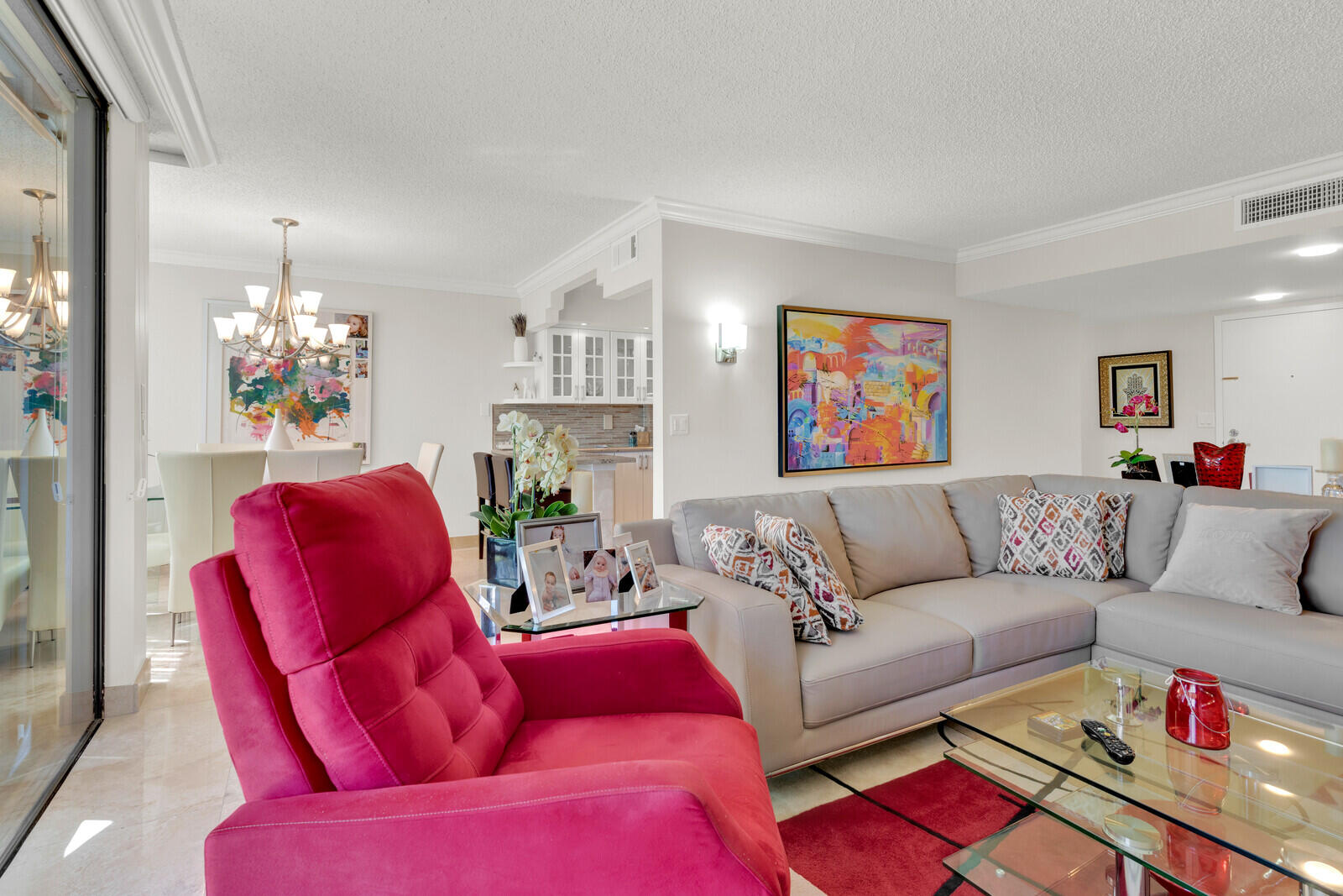 799 Jeffery Street, Unit 4070 Boca Raton, FL 33487 - Photo 4 of 41 a living room with furniture and a chandelier