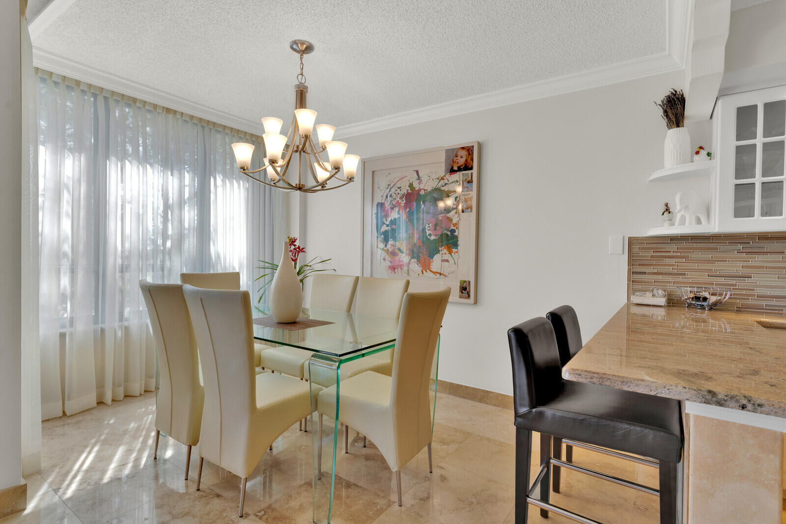 799 Jeffery Street, Unit 4070 Boca Raton, FL 33487 - Photo 8 of 41 a dining room with furniture a chandelier and window