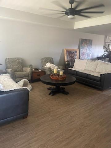 a living room with furniture and a table