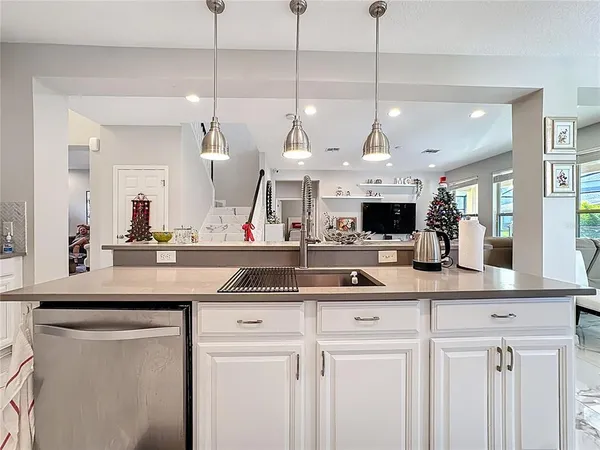 a bedroom with double bed and a large window