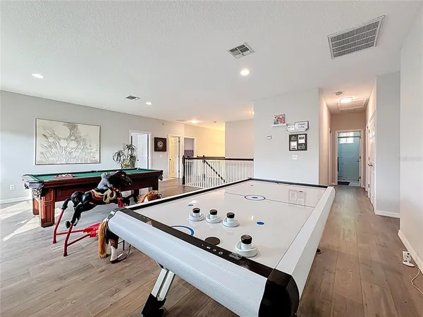 a aerial view of a house with a yard