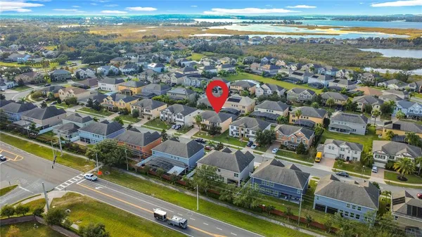 an aerial view of a city with lots of residential buildings