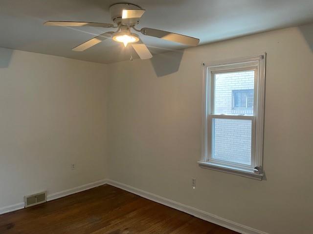 1705 North Walnut Street Ambridge, PA 15003 - Photo 13 of 30 a view of a small space with wooden floor a fan and a window