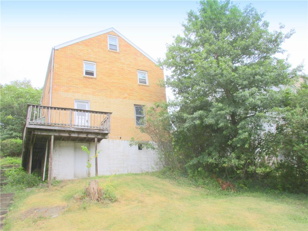 1705 North Walnut Street Ambridge, PA 15003 - Photo 3 of 30 a view of a house with balcony