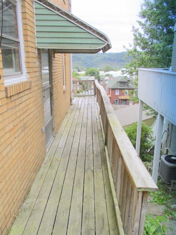 1705 North Walnut Street Ambridge, PA 15003 - Photo 9 of 30 a view of balcony with wooden floor and outdoor space