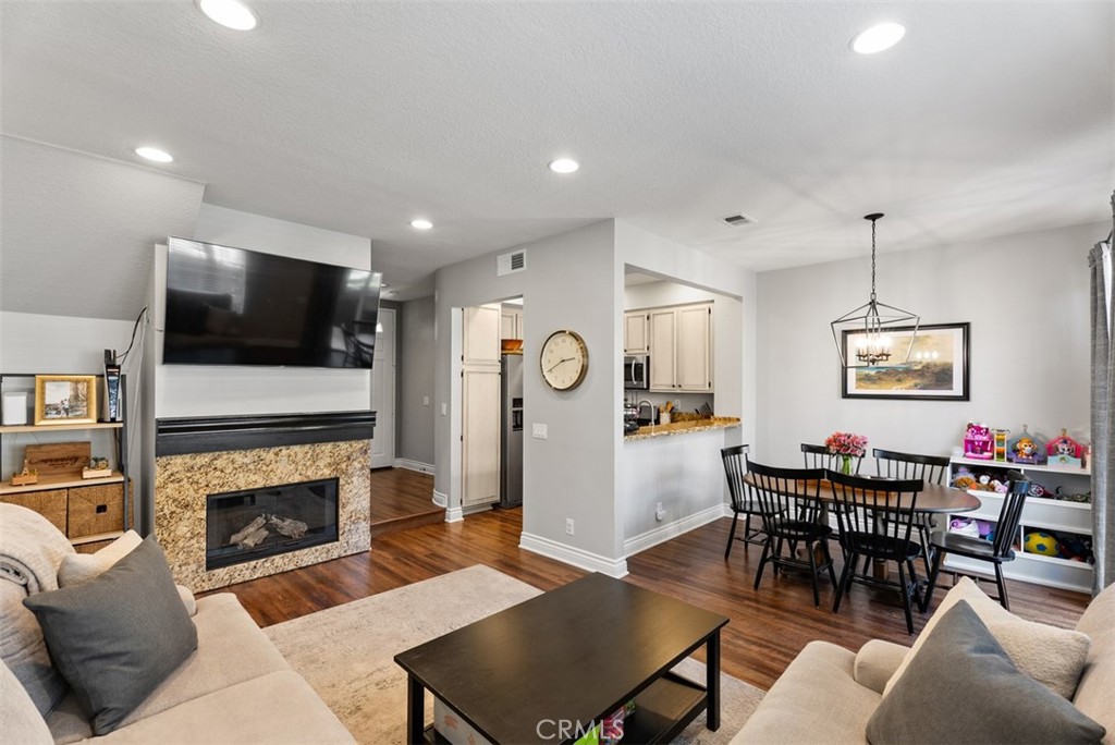 254 Pasto Rico Rancho Santa Margarita, CA 92688 - Photo 3 of 30 Living Room Opens to Kitchen and Dining Area
