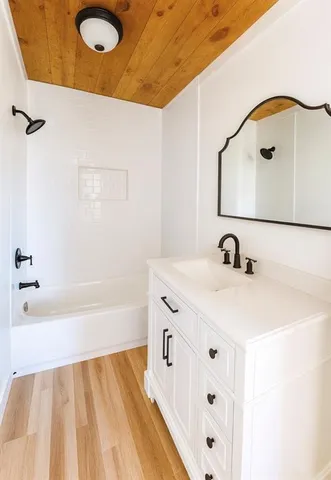 a bathroom with a sink and a tub
