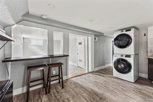 a view of a hallway with washer and dryer
