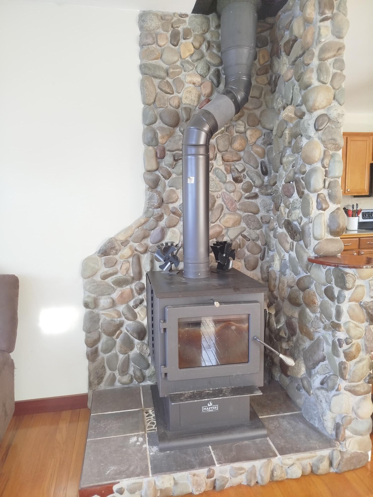 717 Crystal Road Crystal, ME 04747 - Photo 18 of 81 wood stove