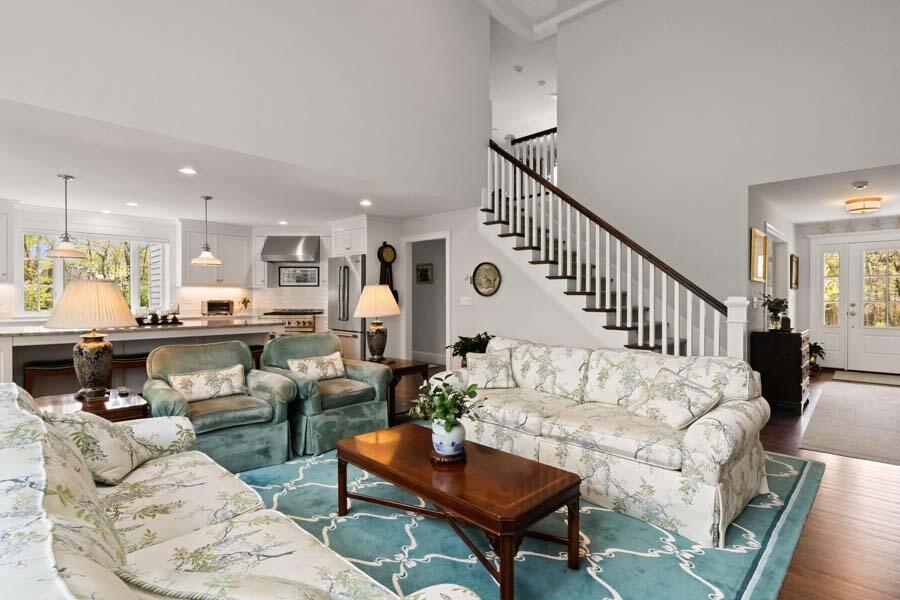 19 Bascom Hollow Harwich, MA 02645 - Photo 16 of 43 a living room with furniture and kitchen view