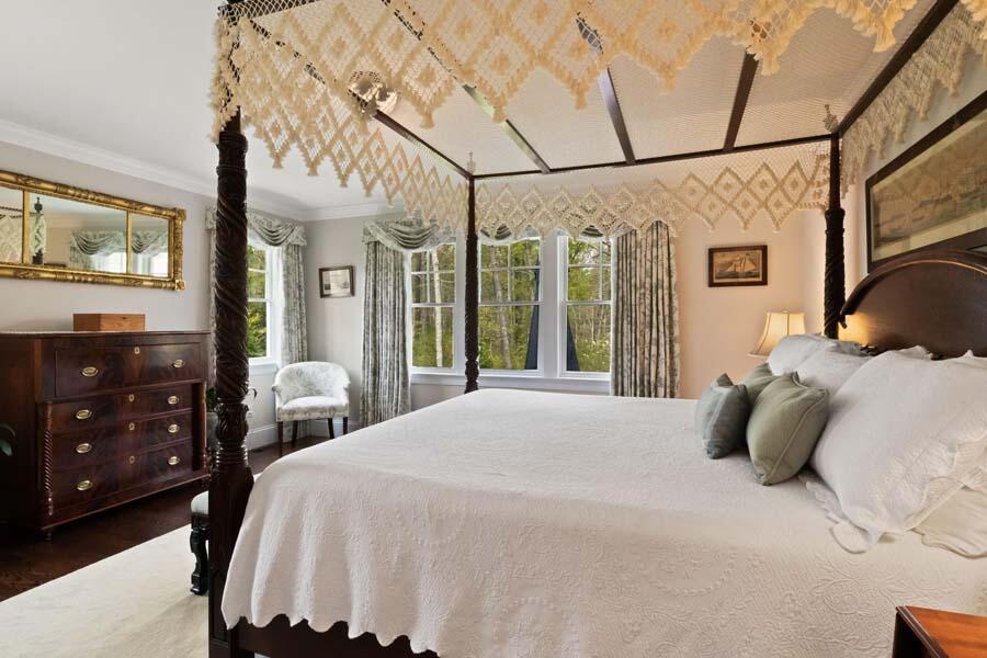 19 Bascom Hollow Harwich, MA 02645 - Photo 22 of 43 a bedroom with a bed a closet and large mirror