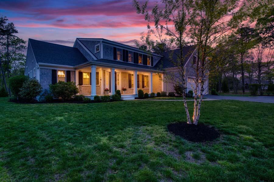 19 Bascom Hollow Harwich, MA 02645 - Photo 3 of 43 a front view of a house with a garden