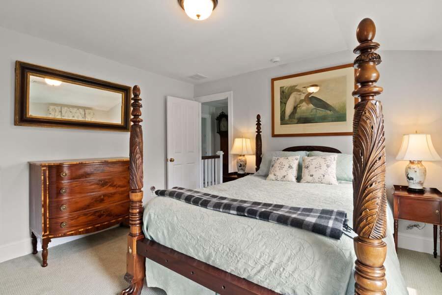 19 Bascom Hollow Harwich, MA 02645 - Photo 31 of 43 a bedroom with a bed and a flat screen tv