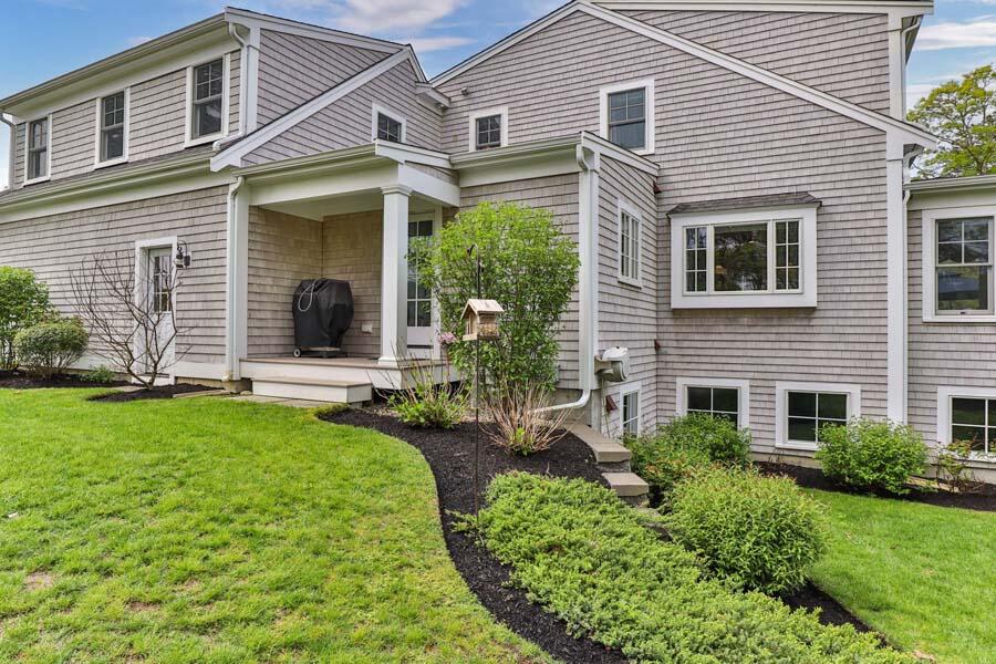 19 Bascom Hollow Harwich, MA 02645 - Photo 35 of 43 front view of a house with a yard