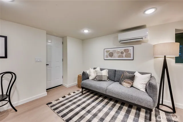 a bedroom with bed and a window