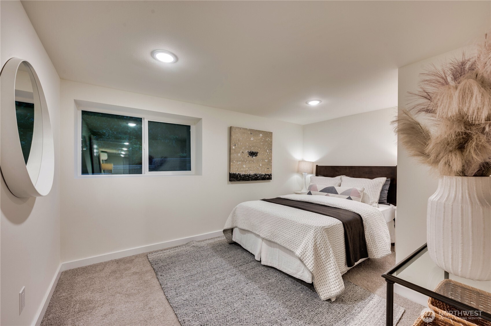 15804 Maplewild Avenue Southwest Burien, WA 98166 - Photo 31 of 37 a bedroom with bed and a window