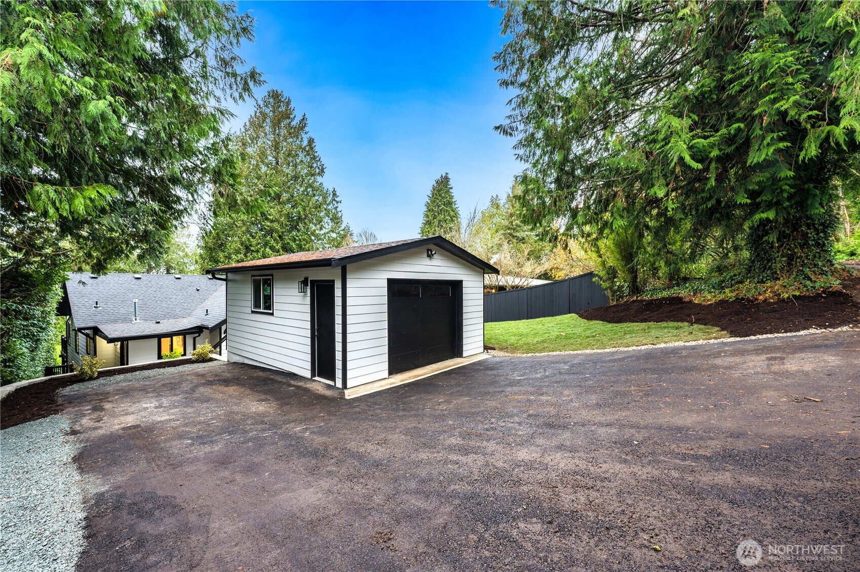 15804 Maplewild Avenue Southwest Burien, WA 98166 - Photo 33 of 37 a view of a house with a yard and large tree