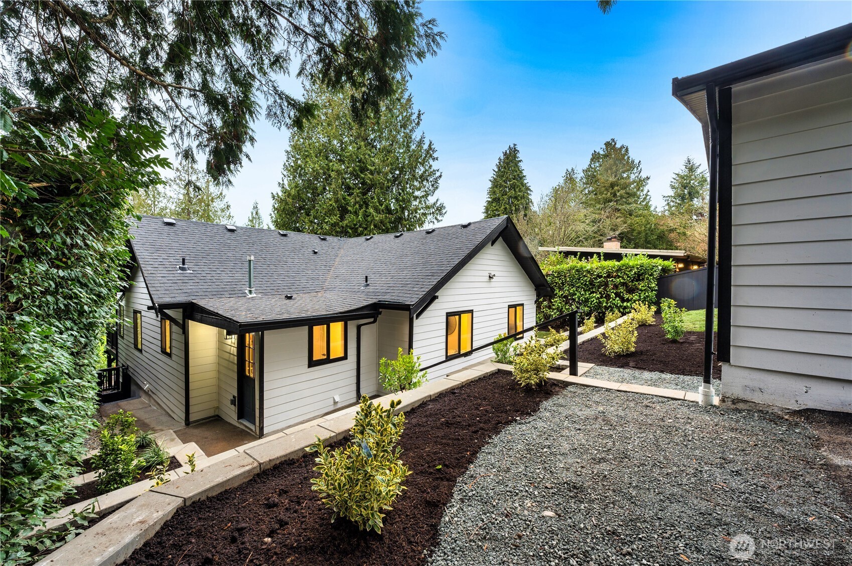15804 Maplewild Avenue Southwest Burien, WA 98166 - Photo 34 of 37 a view of a house with a small yard plants and large tree