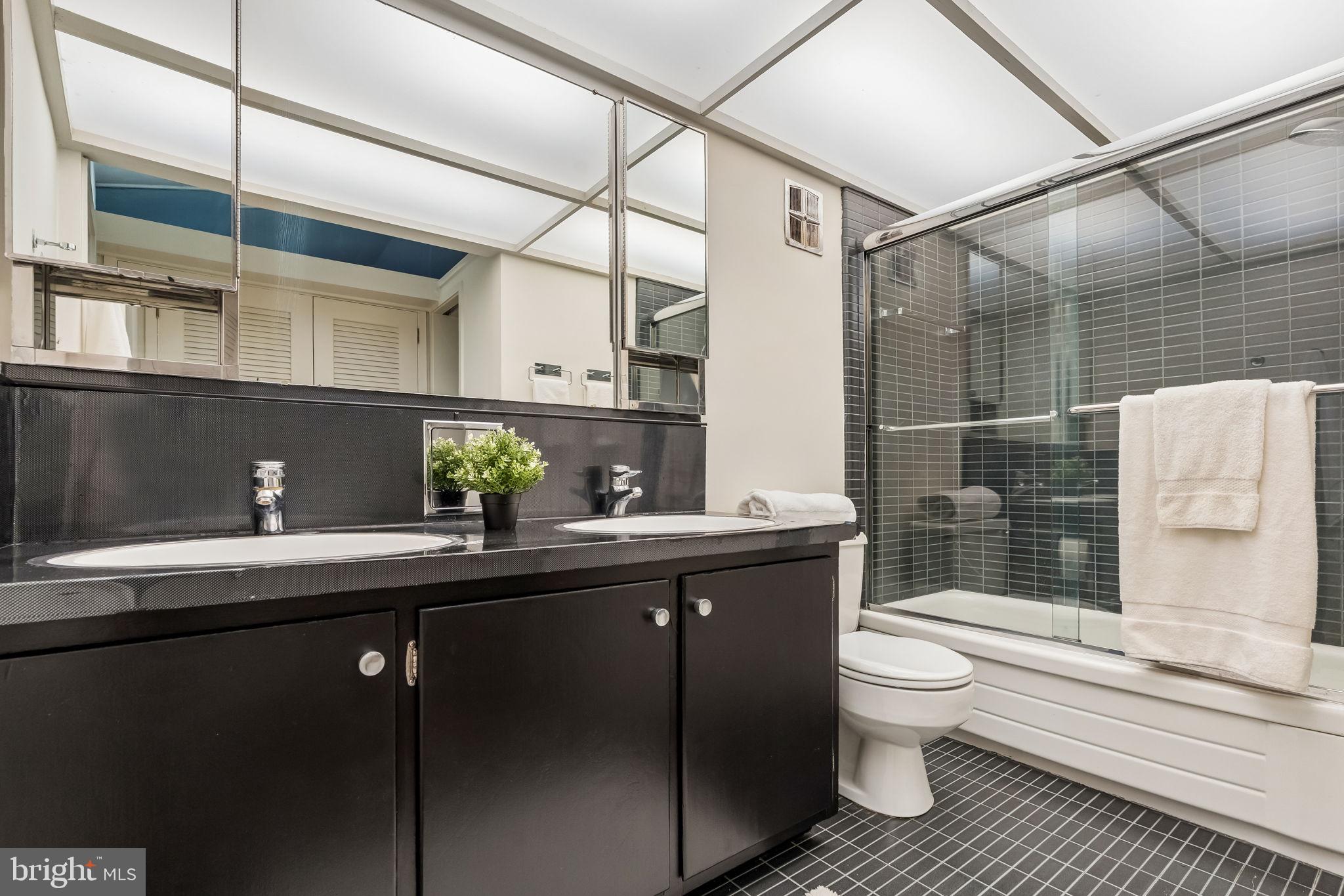 1640 Monk Road Gladwyne, PA 19035 - Photo 15 of 41 a bathroom with a sink toilet and shower