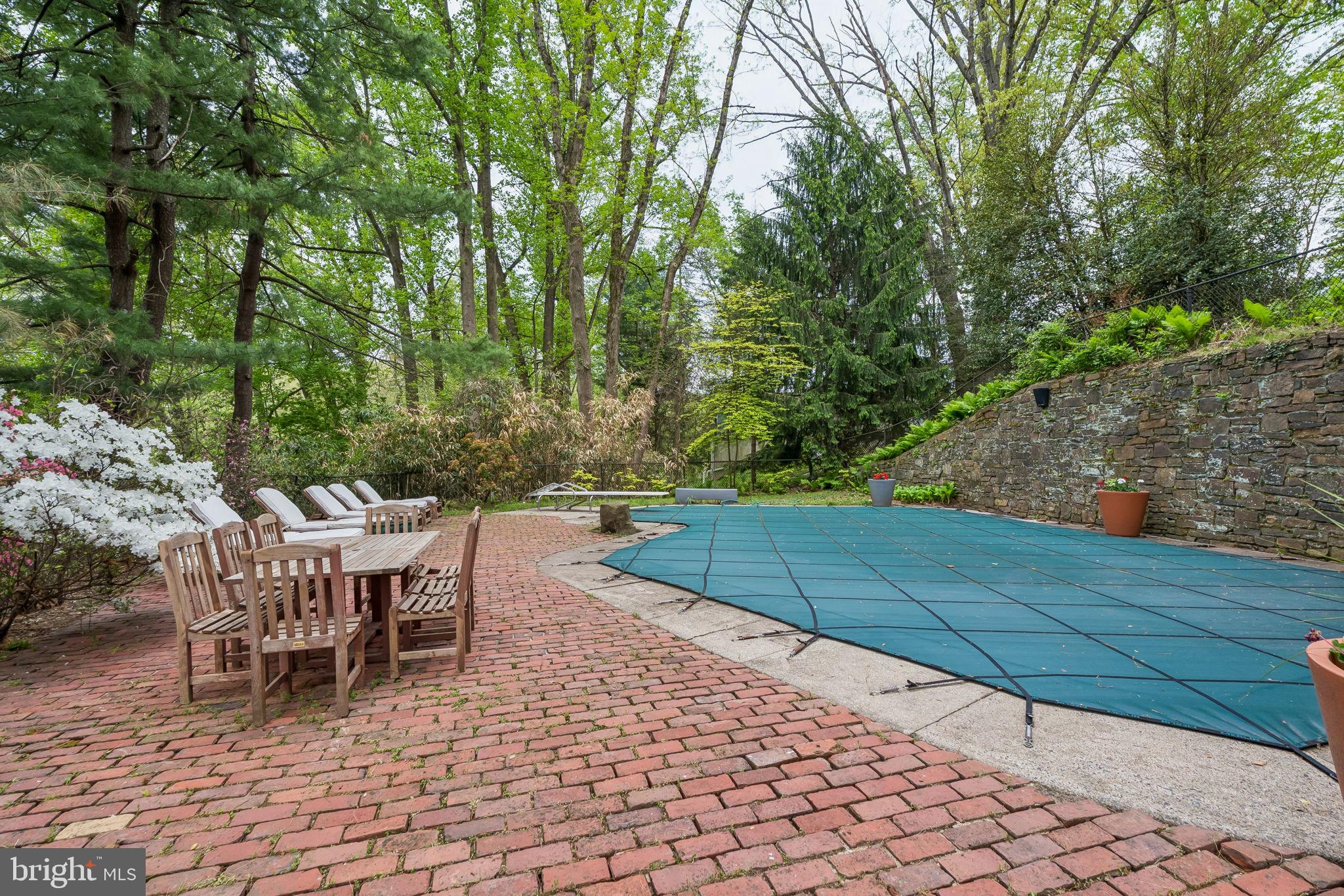 1640 Monk Road Gladwyne, PA 19035 - Photo 36 of 41 a view of a patio with table and chairs and couches