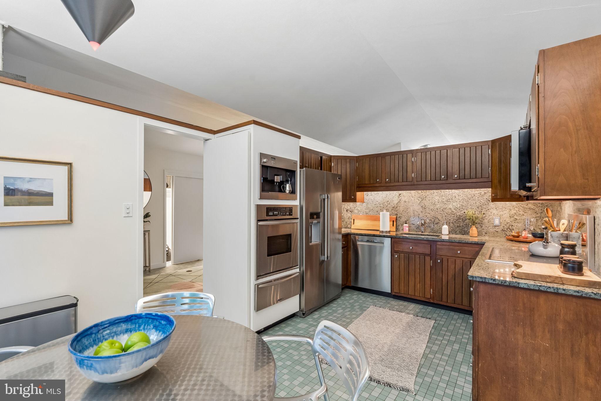 1640 Monk Road Gladwyne, PA 19035 - Photo 4 of 41 a kitchen with stainless steel appliances a sink and a refrigerator