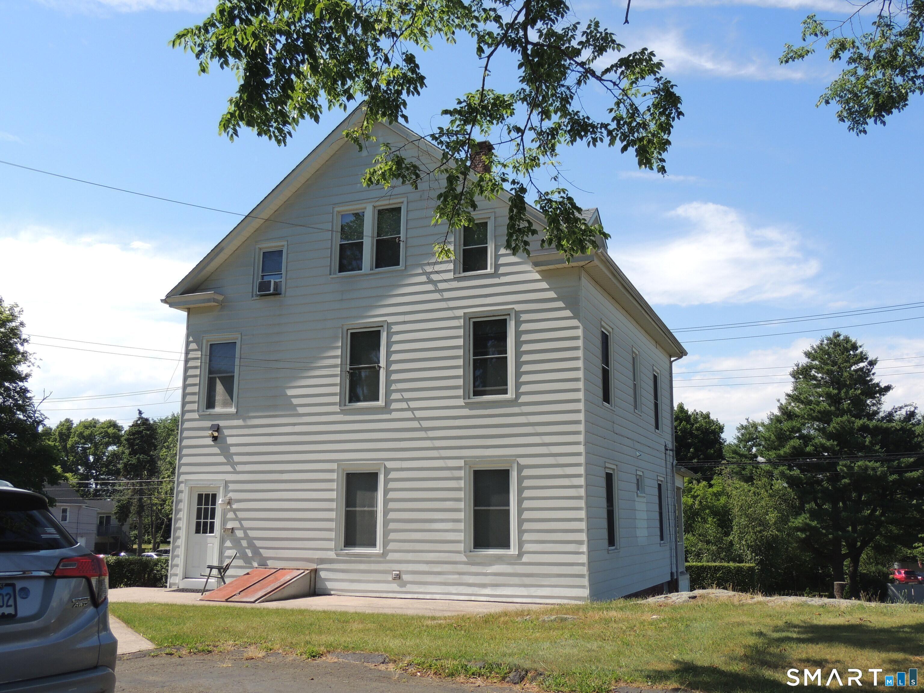 132 Silver Sands Road, Unit 1 East Haven, CT 06512 - Photo 3 of 20 Rear view