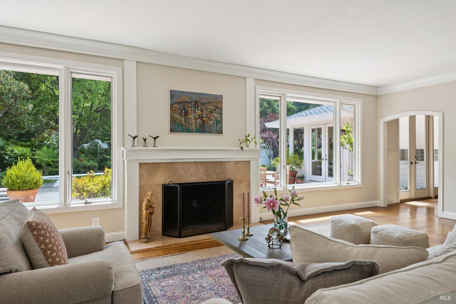 1199 Butterfield Road San Anselmo, CA 94960 - Photo 13 of 65 a living room with furniture and a fireplace