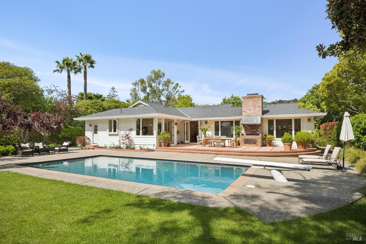 1199 Butterfield Road San Anselmo, CA 94960 - Photo 15 of 65 a front view of a house with swimming pool having outdoor seating
