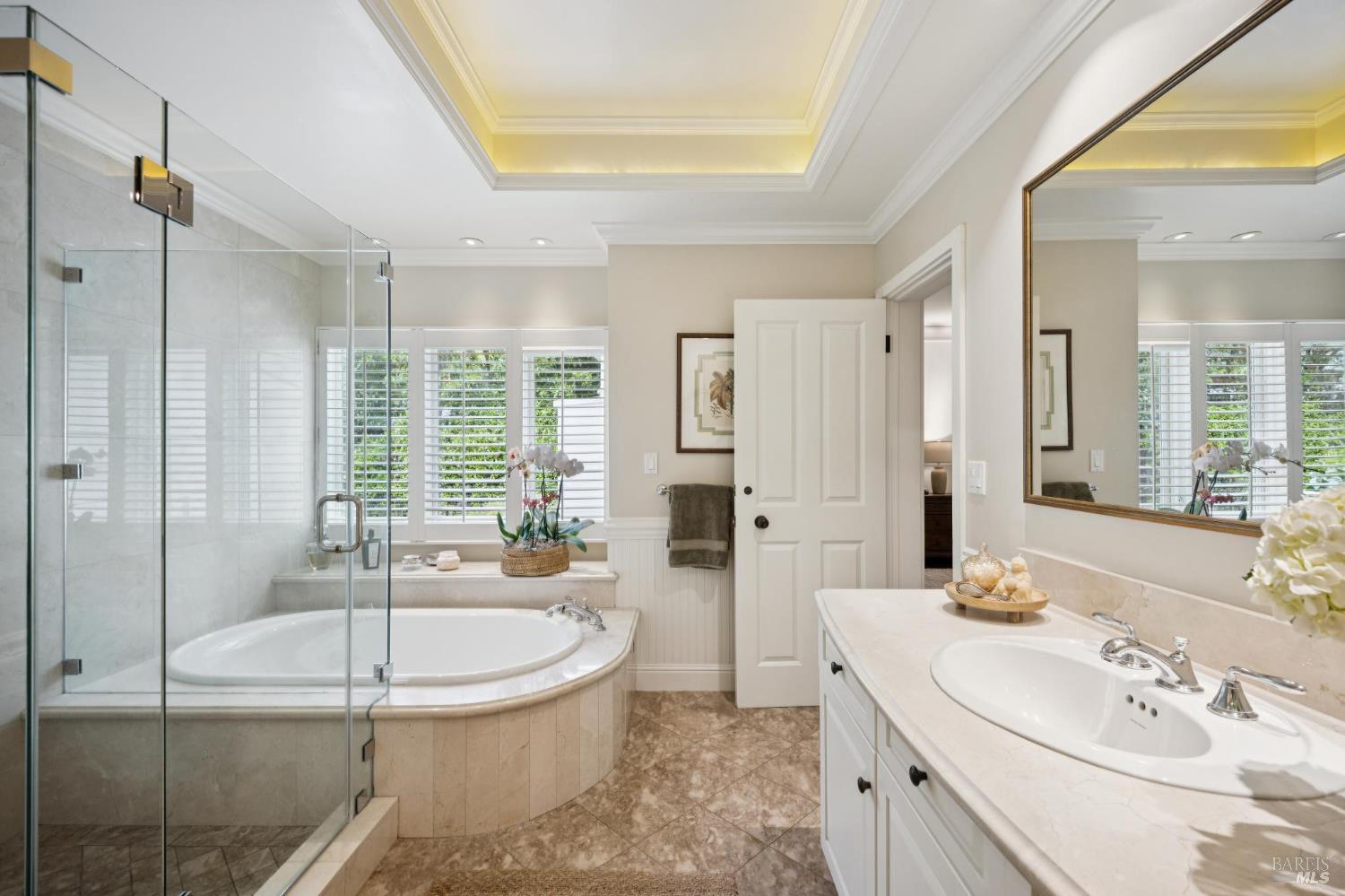 1199 Butterfield Road San Anselmo, CA 94960 - Photo 28 of 65 a spacious bathroom with a tub sink and mirror