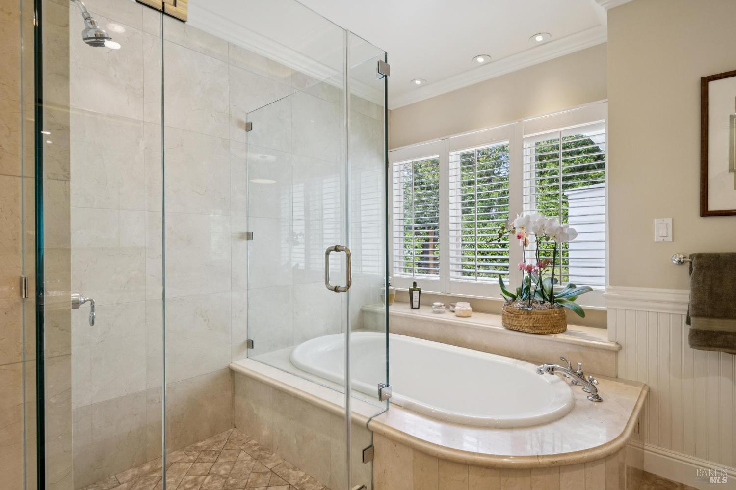 1199 Butterfield Road San Anselmo, CA 94960 - Photo 29 of 65 a bathroom with a tub a sink a mirror and a shower