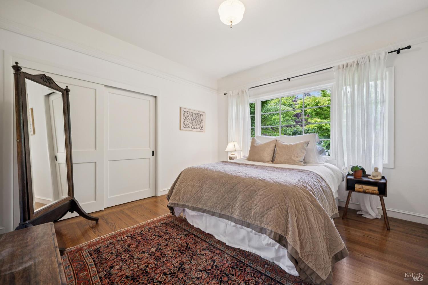 1199 Butterfield Road San Anselmo, CA 94960 - Photo 30 of 65 a bedroom with a bed and a window