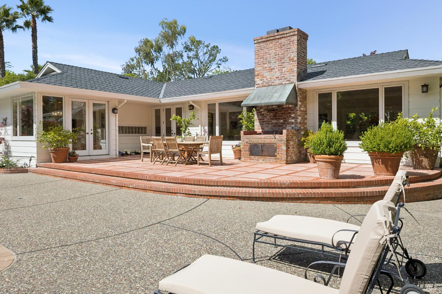 1199 Butterfield Road San Anselmo, CA 94960 - Photo 54 of 65 a view of a patio with couches table and chairs