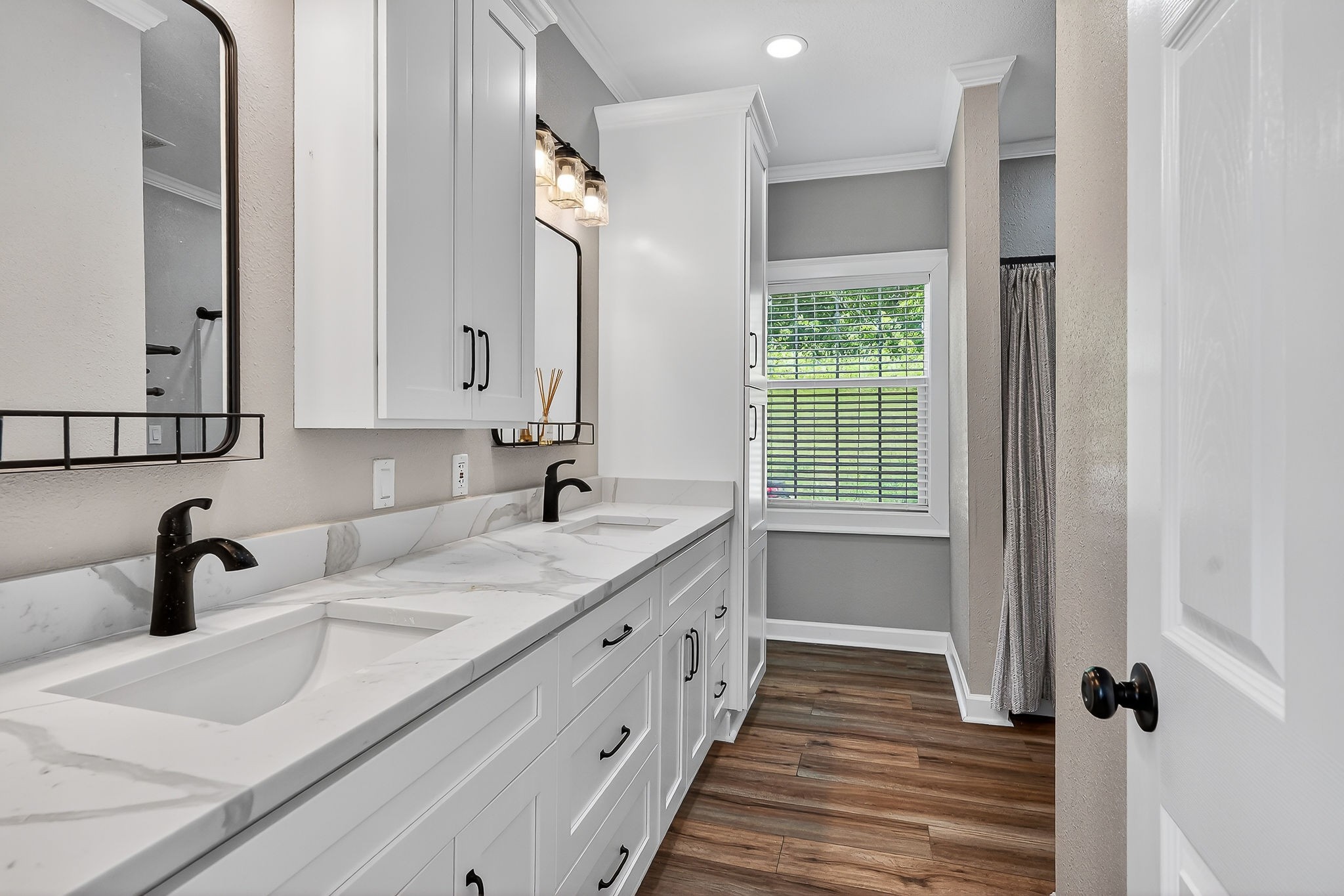 16062 Buffalo Valley Road Silver Point, TN 38582 - Photo 14 of 27 a bathroom with a double vanity sink and mirror