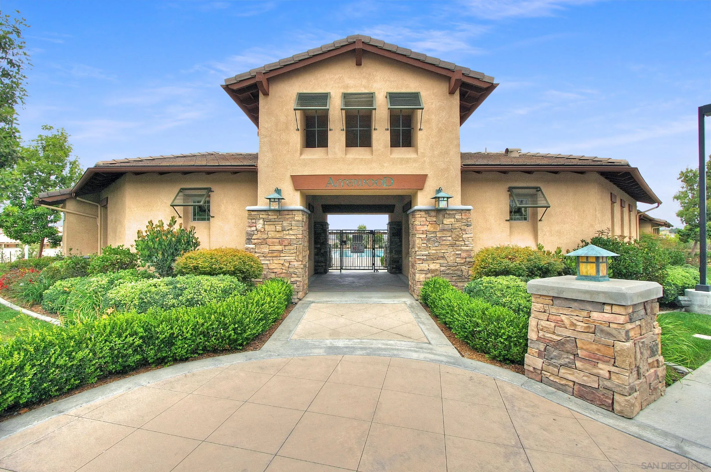 1175 Tee Street Oceanside, CA 92057 - Photo 24 of 26 a front view of a house with garden