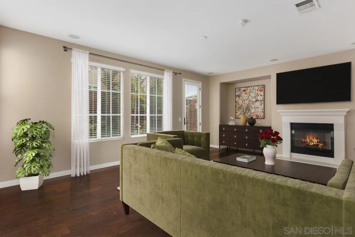 1175 Tee Street Oceanside, CA 92057 - Photo 4 of 26 a living room with furniture fireplace and flat screen tv
