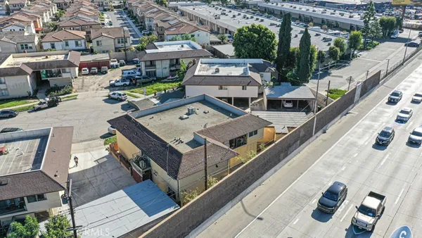 a aerial view of a house with a swimming pool