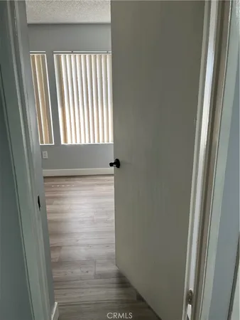 a bathroom with a glass door shower