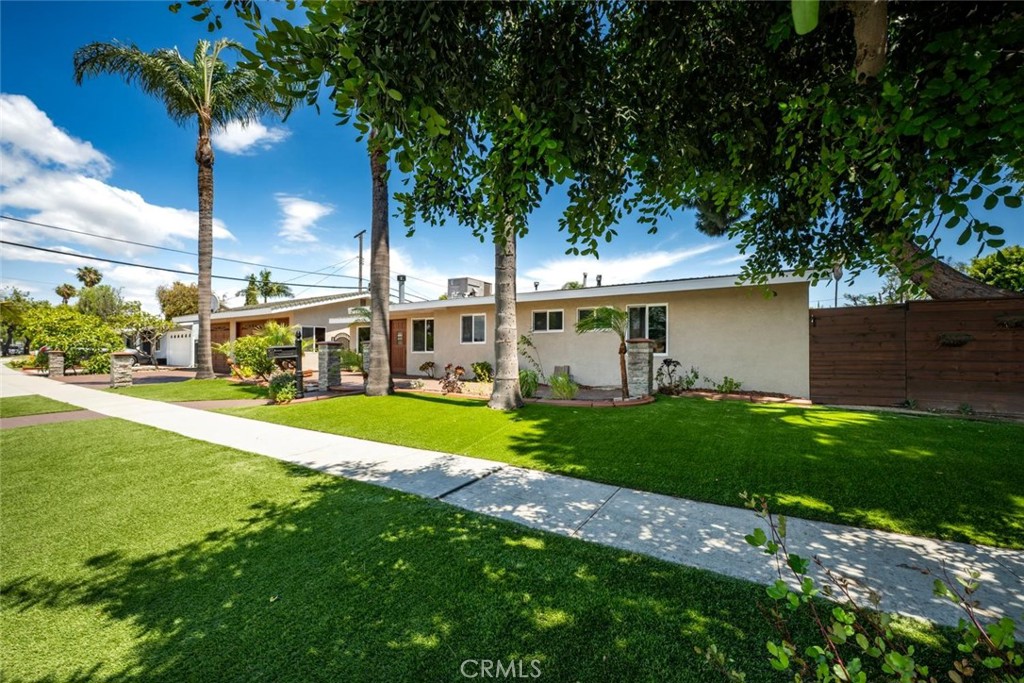1238 North Studebaker Road Long Beach, CA 90815 - Photo 43 of 47 a view of a house with a backyard