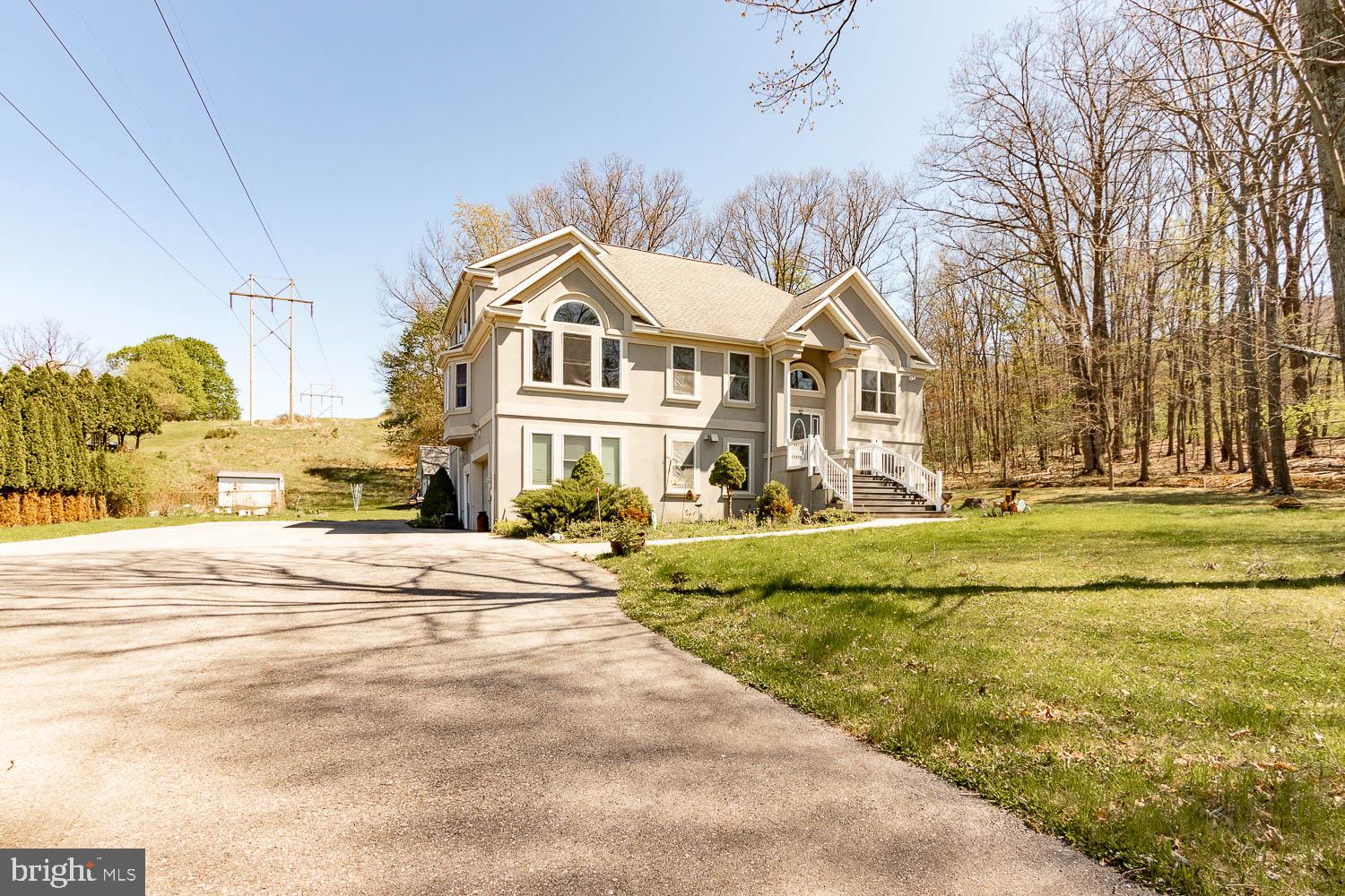 321 Mount Nittany Road Lemont, PA 16851 - Photo 2 of 48 Charming home nestled in nature's embrace.