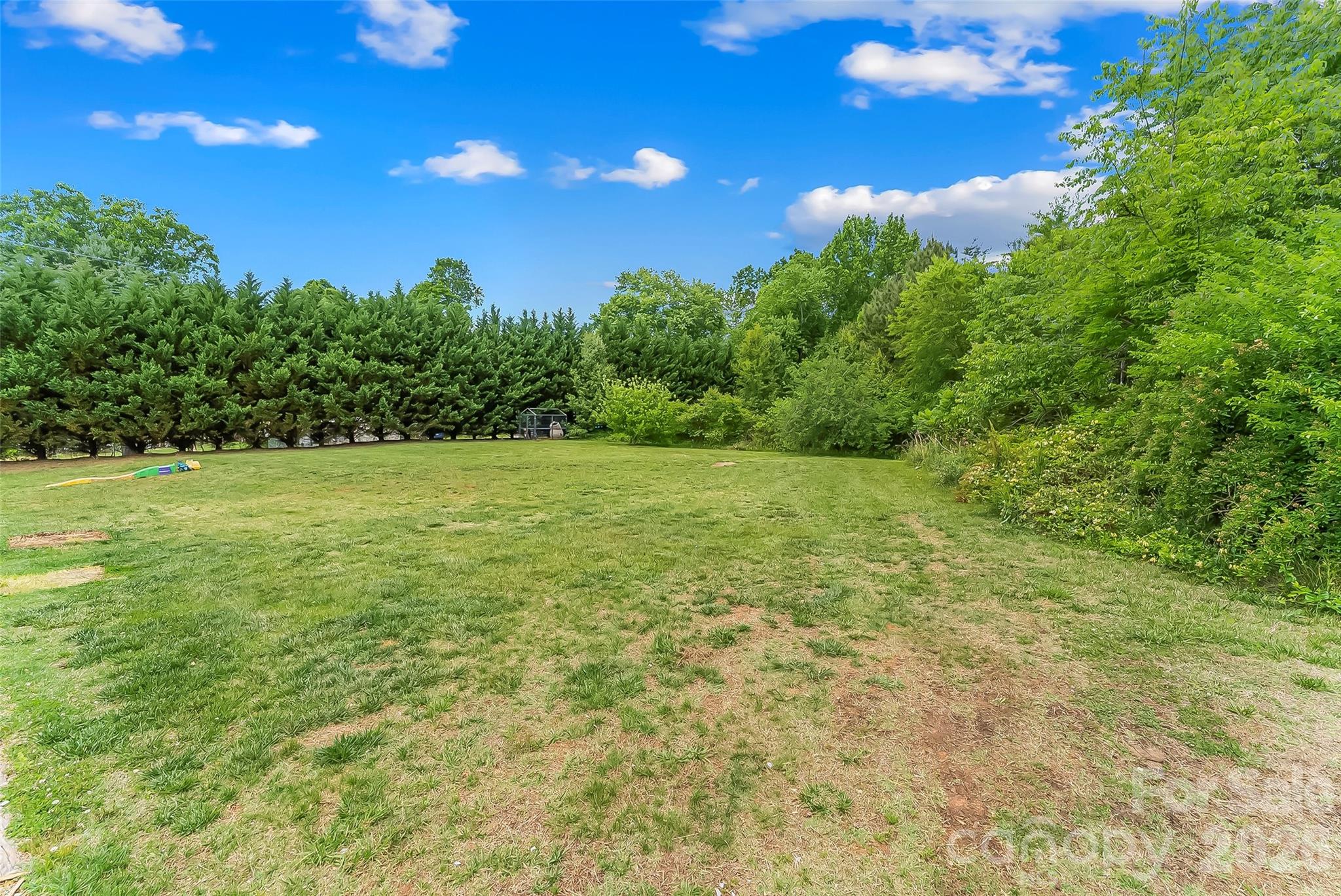 1498 Salem Road Morganton, NC 28655 - Photo 29 of 32 a view of a yard with a house