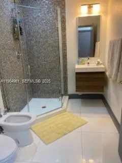 a bathroom with a toilet and a sink