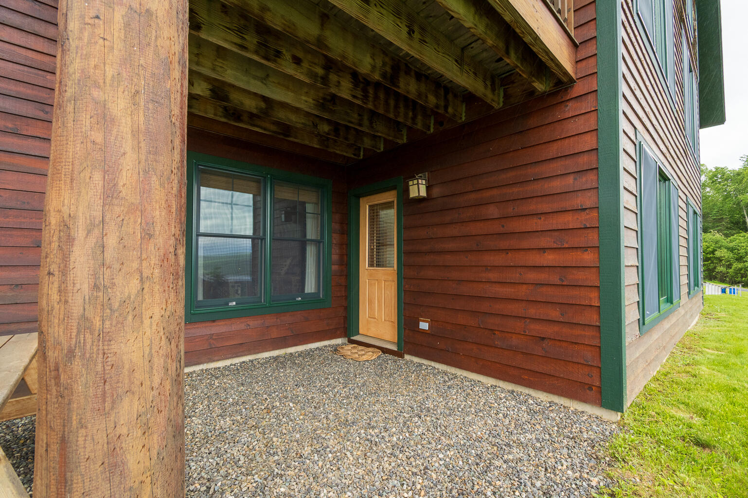 26 Whip Willow Farm Road, Unit 10 Rangeley, ME 04970 - Photo 22 of 35 Lower level patio area