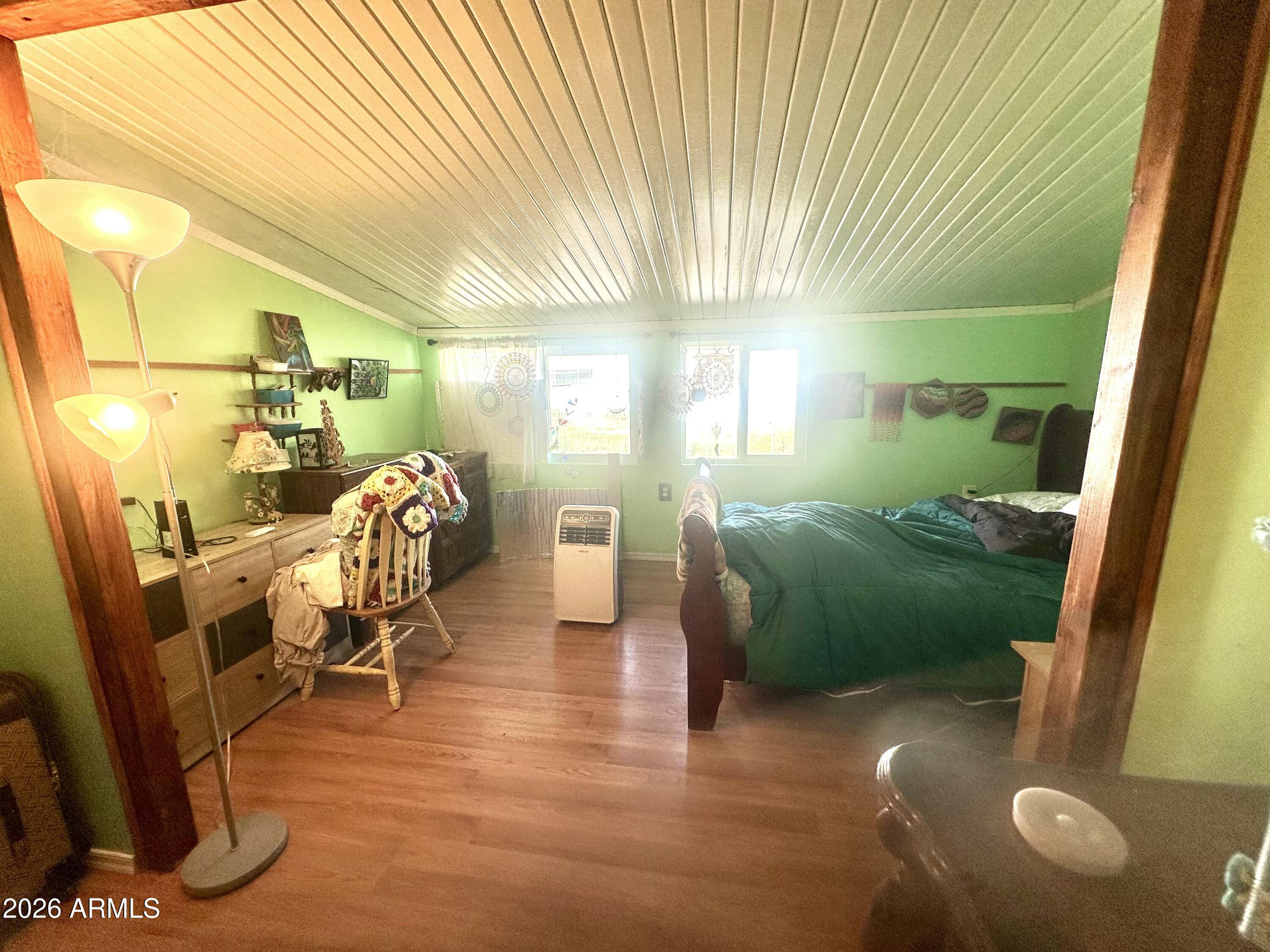 17412 East Trails End Road Mayer, AZ 86333 - Photo 13 of 28 a workspace with furniture and a window