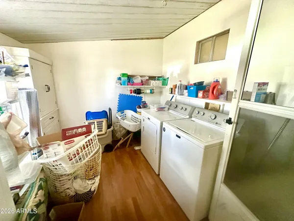 a utility room with dryer and washer