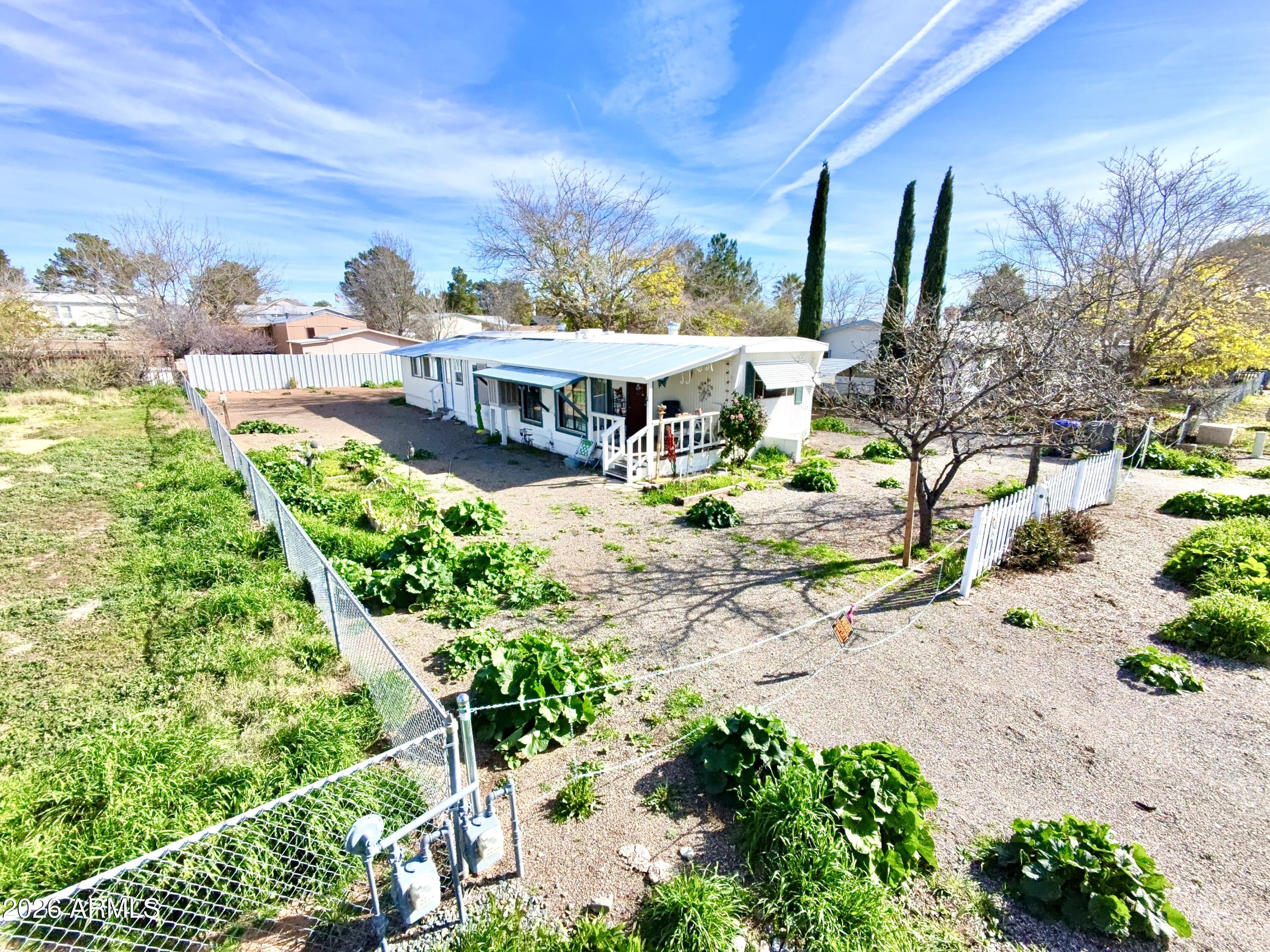 17412 East Trails End Road Mayer, AZ 86333 - Photo 3 of 28 a view of a yard with plants